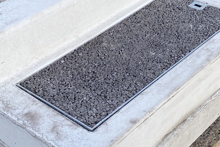 Top view of the EFFI tray set flush into the precast kerb body